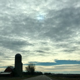 Silo with wide open clouds - photo print