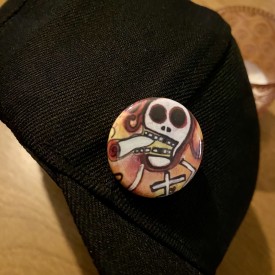 buried at fifty-six - 1.25 inch button