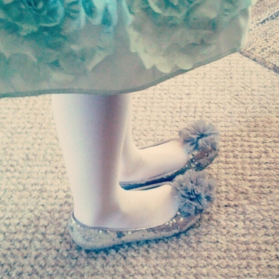 Maggie wearing her new shoes right before the wedding
