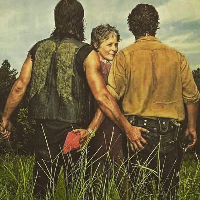 Daryl and Rick holding butts