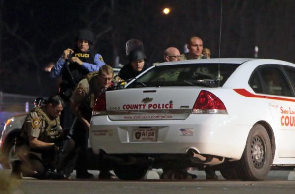 2 officers shot at protest outside Ferguson police station