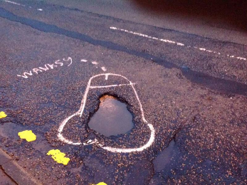Painting penises around potholes