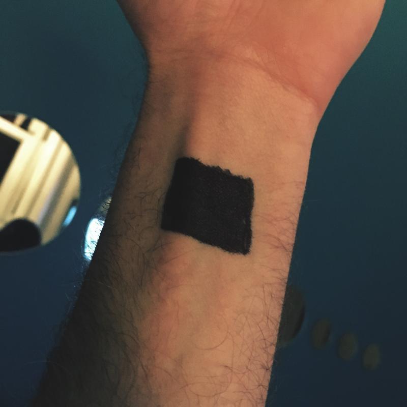 Black magic marker square on my wrist
