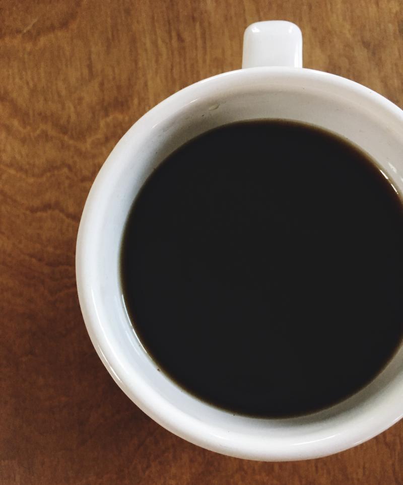 Coffee, black. Always black.