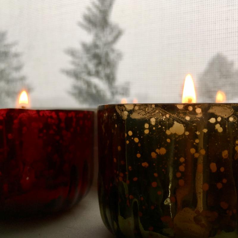 Red and green Christmas candles - daytime