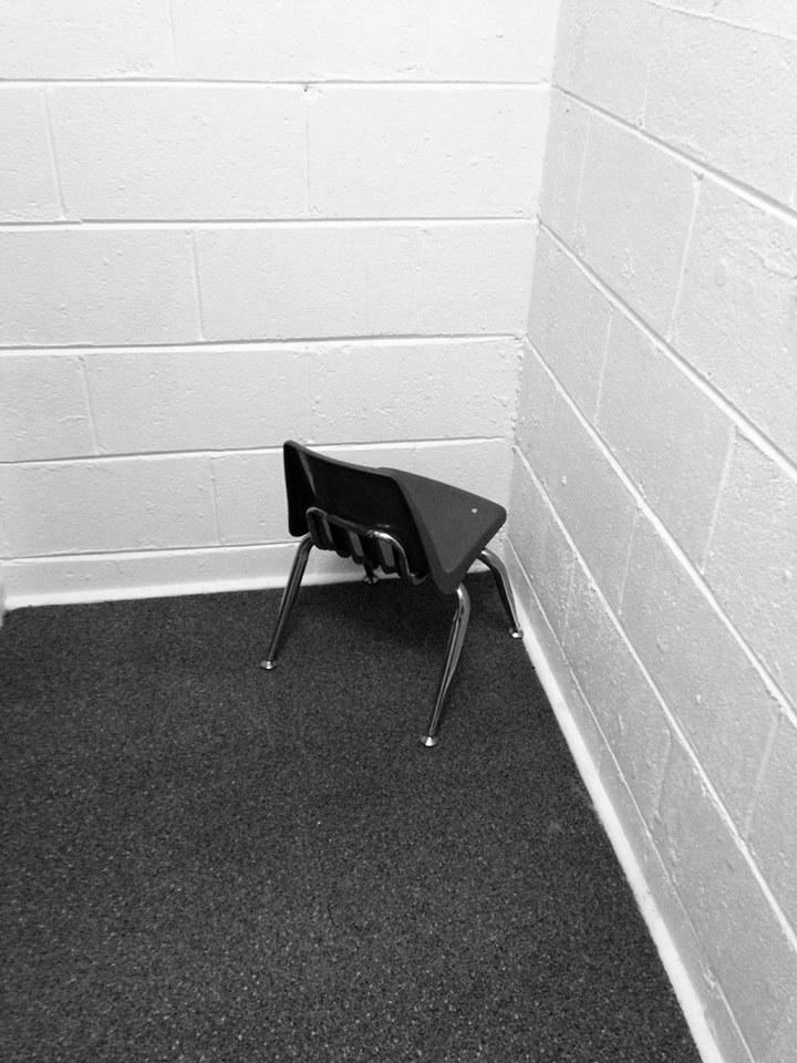 Chair in the brick corner