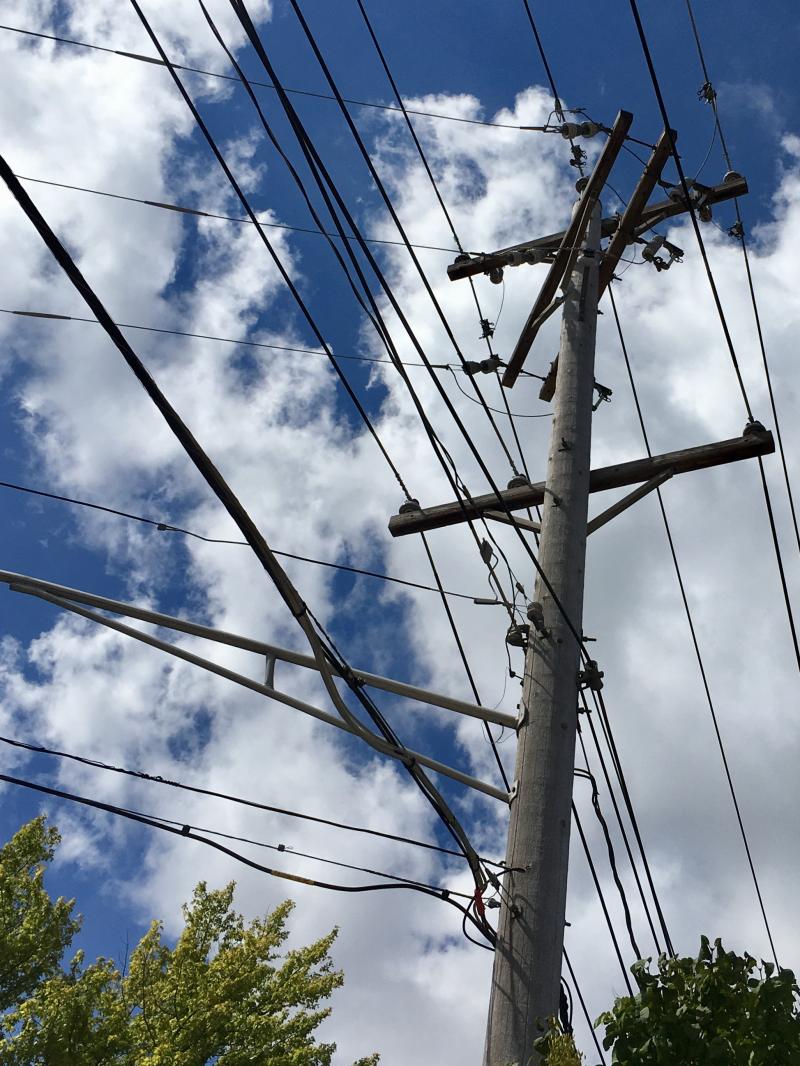 Telephone poles against blue skies 1