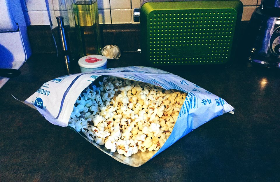 Maggie goes all in when she opens the popcorn