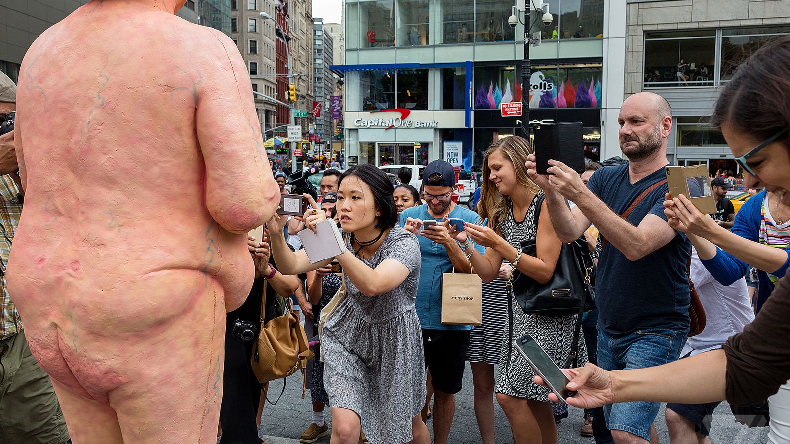 11 photos of NYC’s naked Trump statue