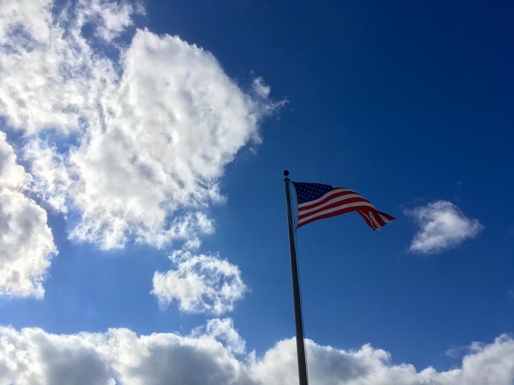 American Flag on a blue blue sky