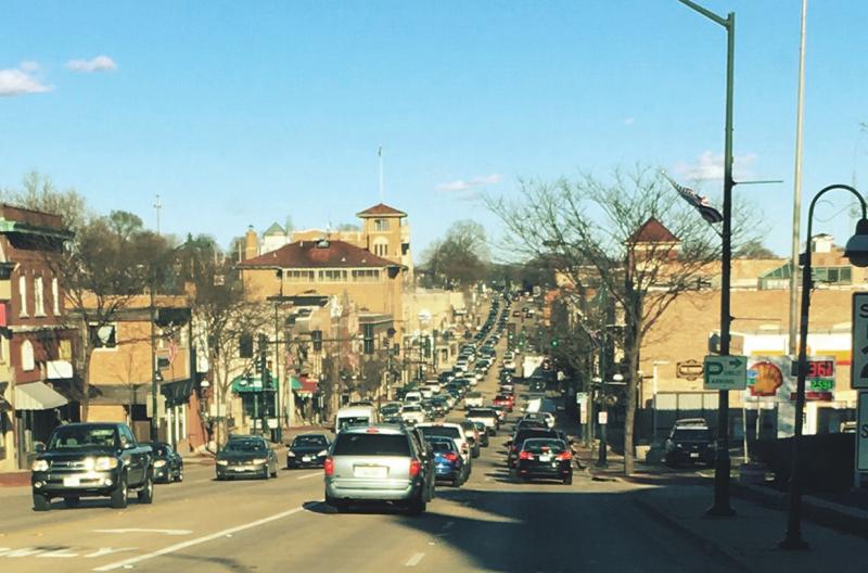 Photo of rush hour traffic and the man