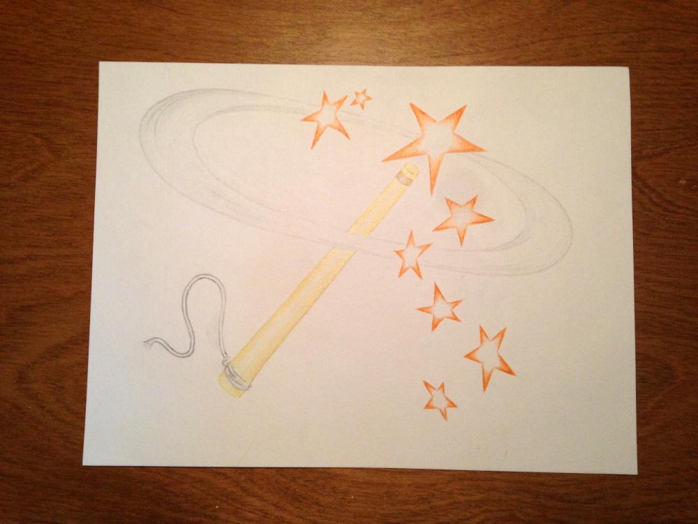 Magic wand with orange stars