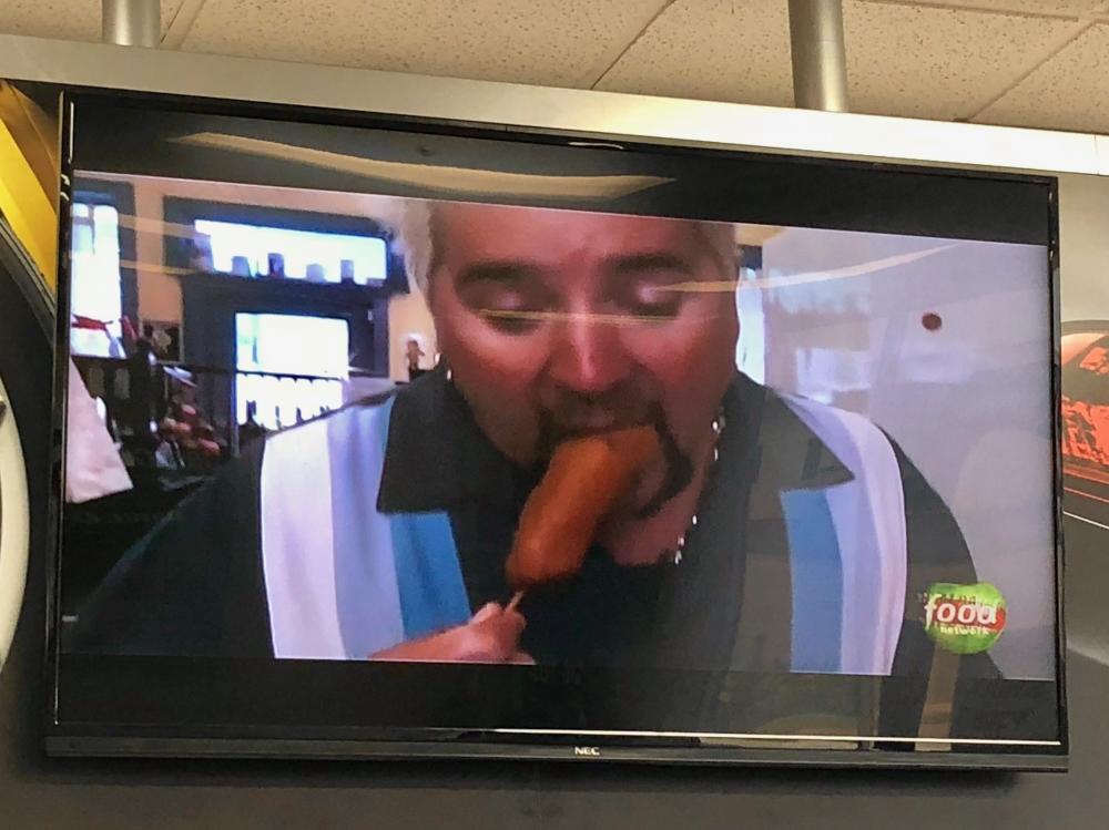 Guy Fieri eating corndog 1