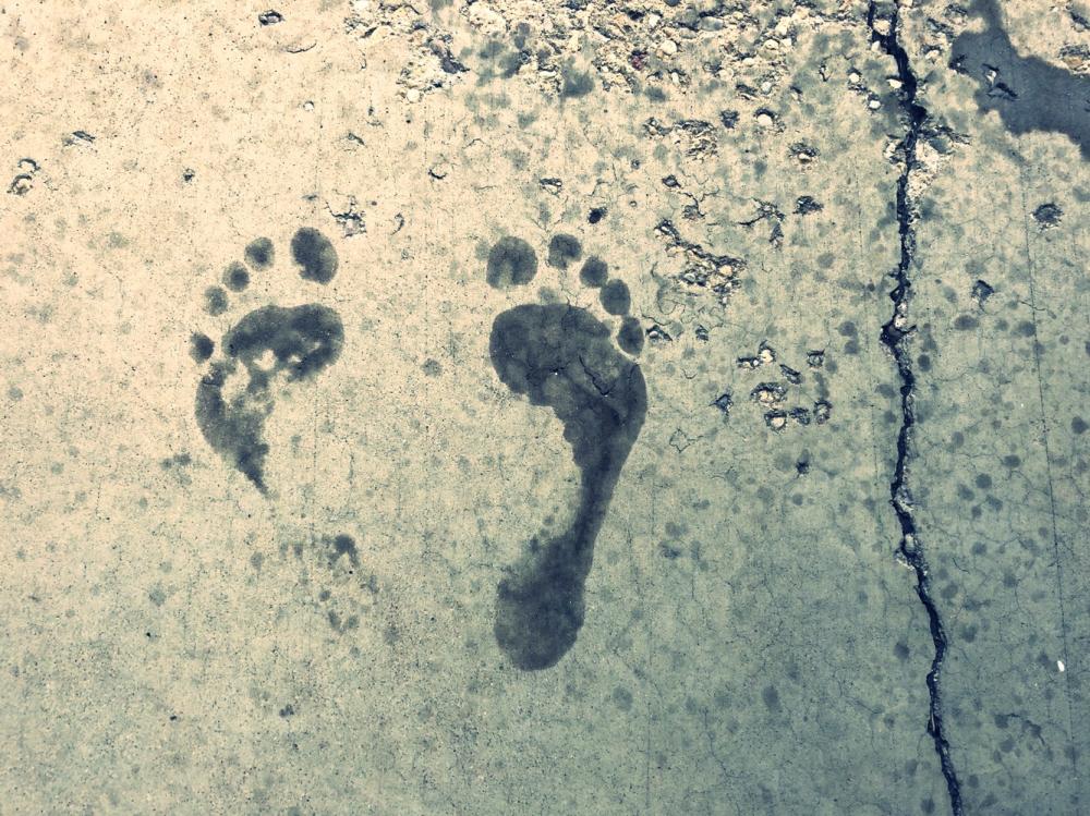 Wet foot prints by themselves