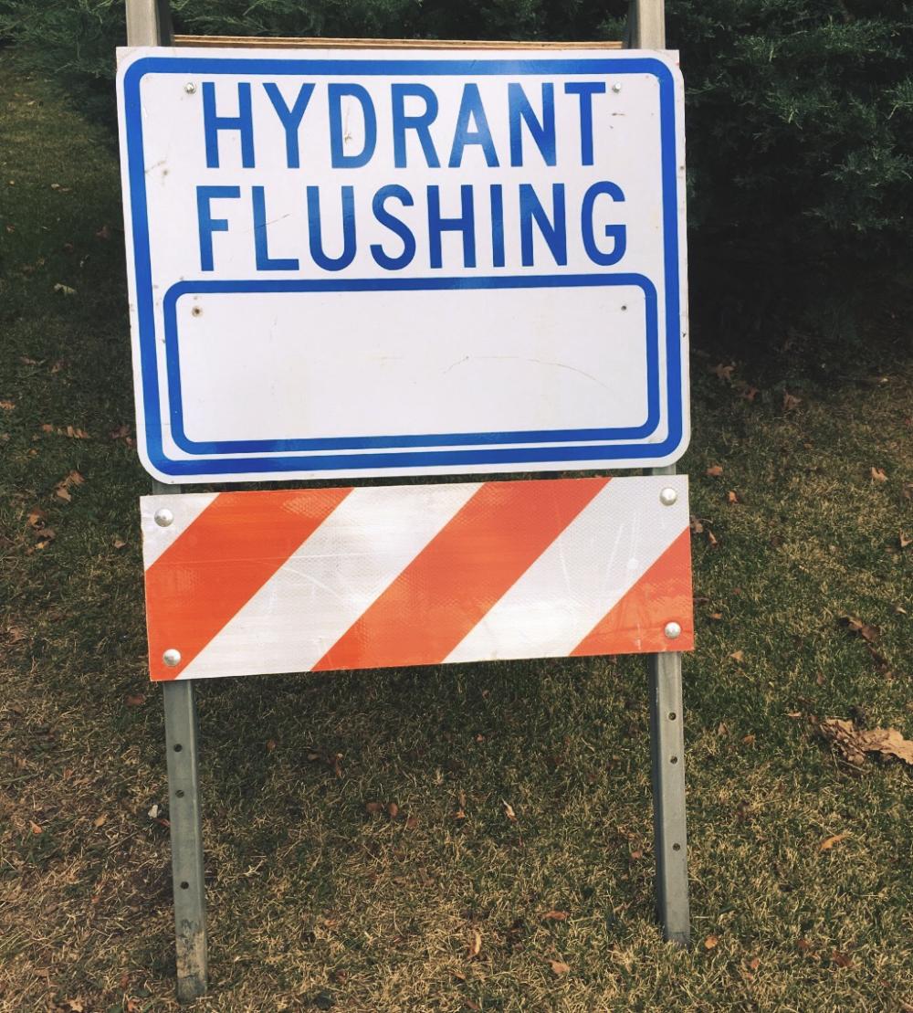 Hydrant flushing sign