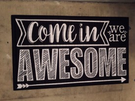 Come in we are Awesome rug