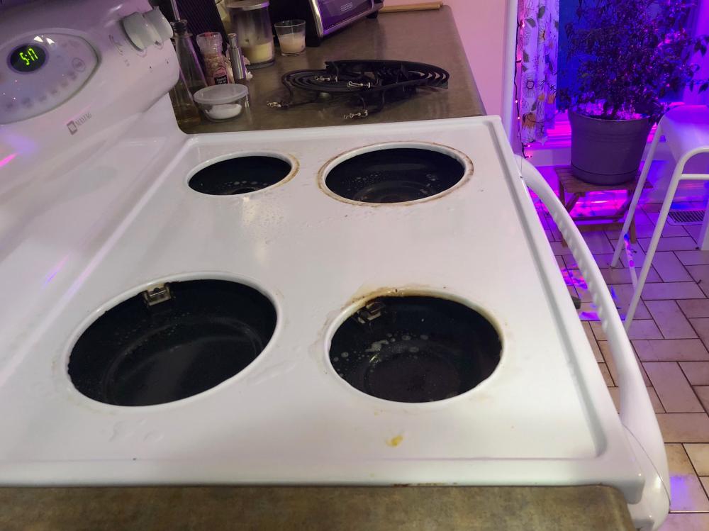 20180119 - Cleaning the stove at 5:17 pm on a Friday