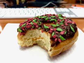 Christmas donut with bite