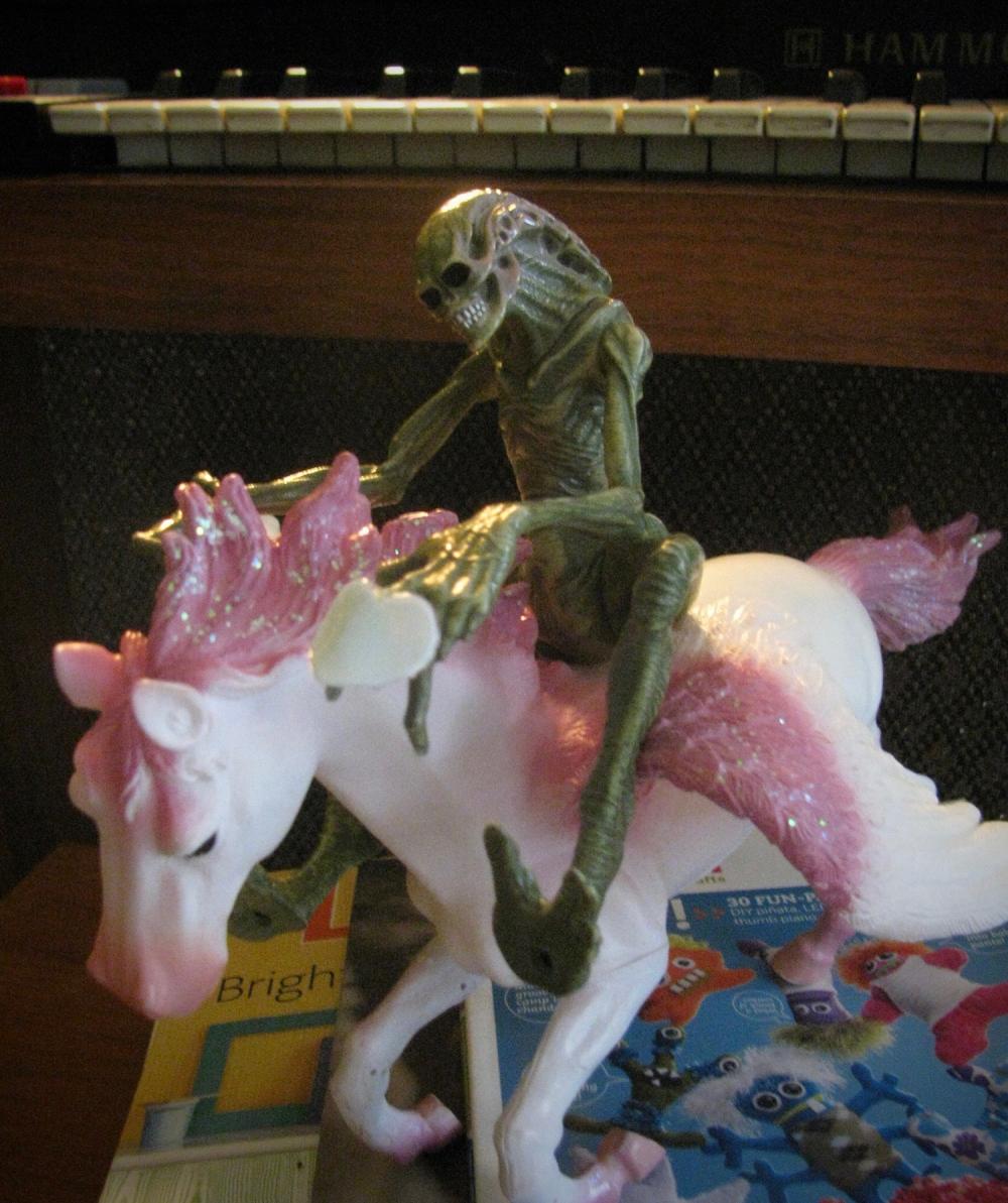 Human alien hybrid riding pegasus