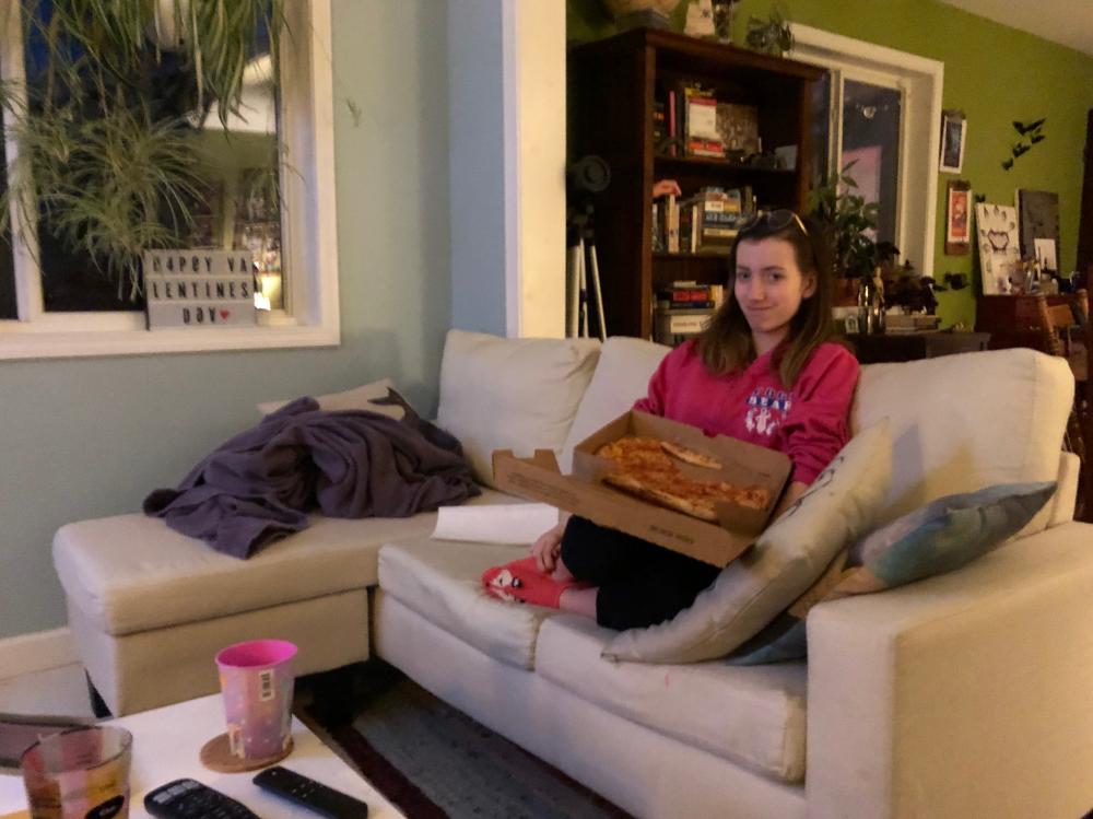 Maggie with pizza box