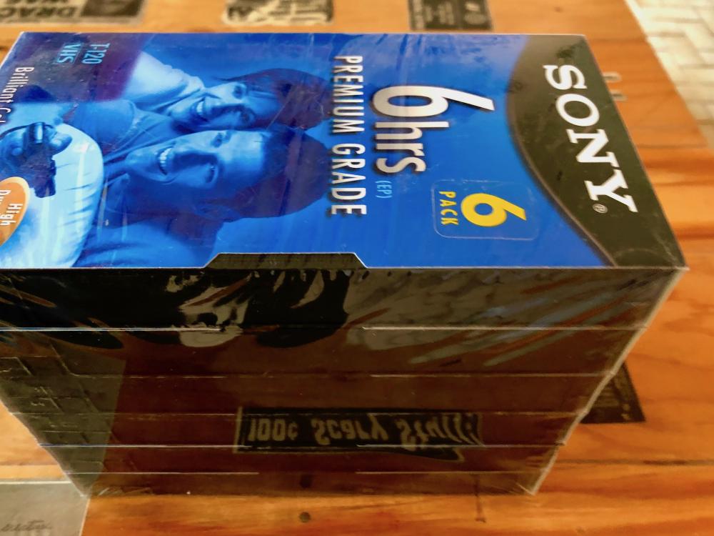 6 pack of shrink wrapped VHS tapes