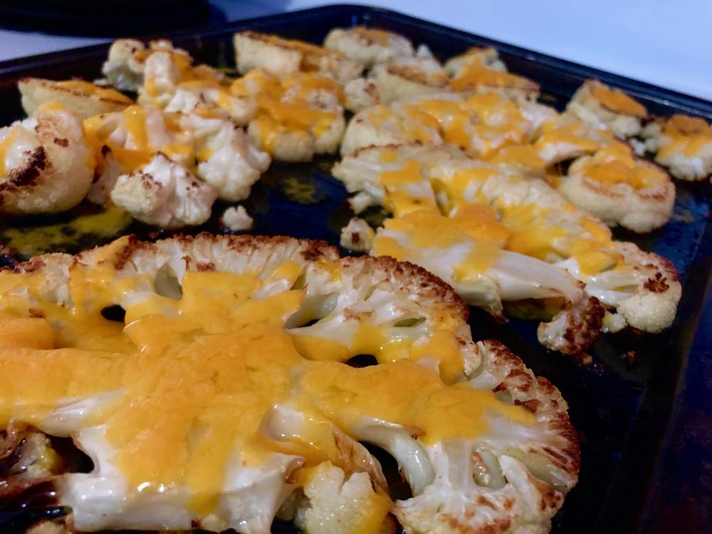 Roasted cauliflower with shitloads of cheddar cheese