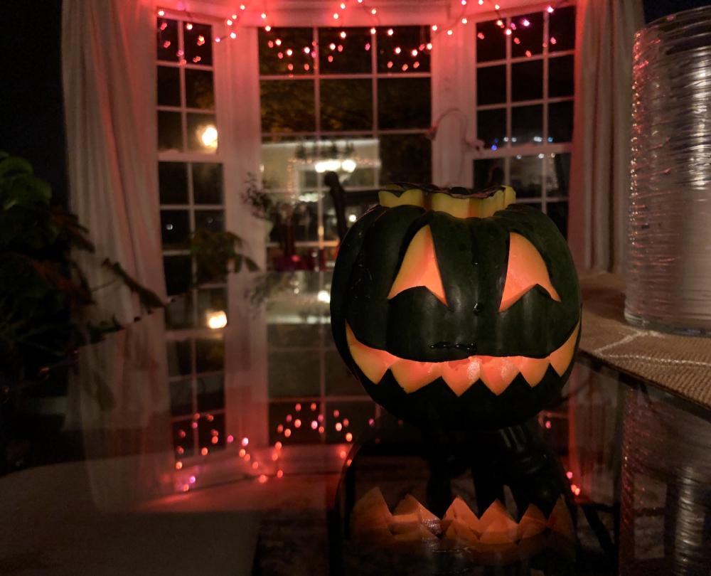 A green acorn squash jack o lantern 4