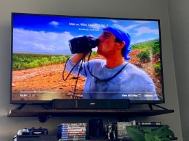 Bear Grylls drinking his own piss and wearing his underwear on his head